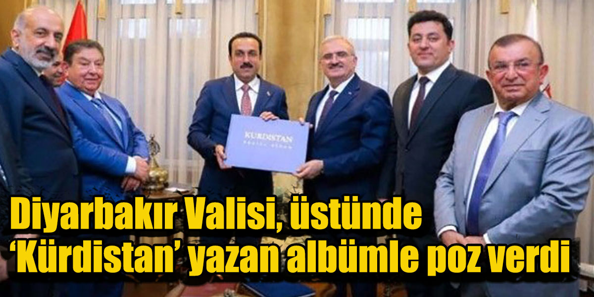 Diyarbakır Valisi Münir Karaloğlu Kürdistan yazılı paçavra ile poz verdi!